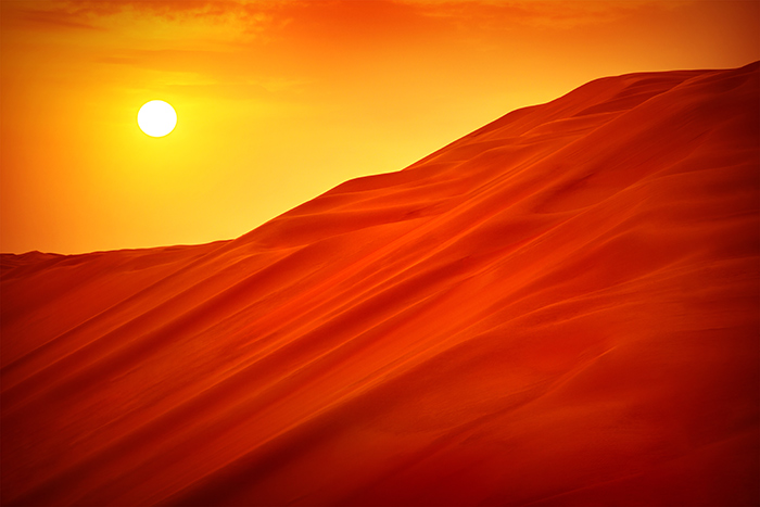 Orange sand dunes in the desert