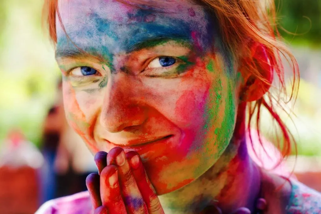 Woman with colorful paint on her face
