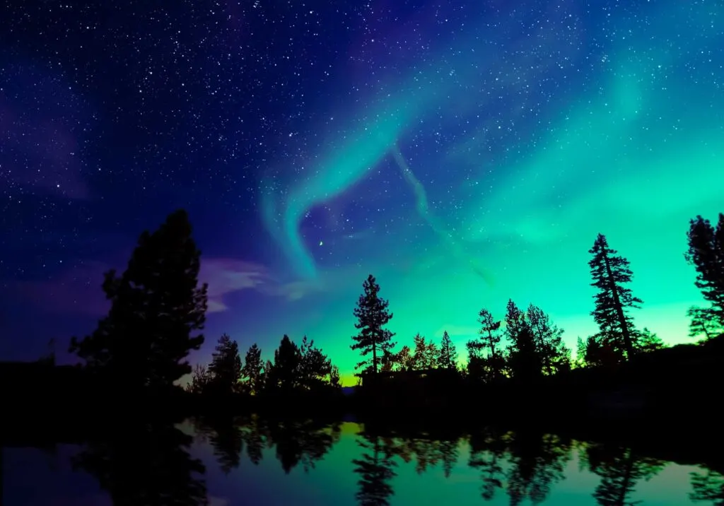 Purple, blue, and green northern lights, made of analogous colors