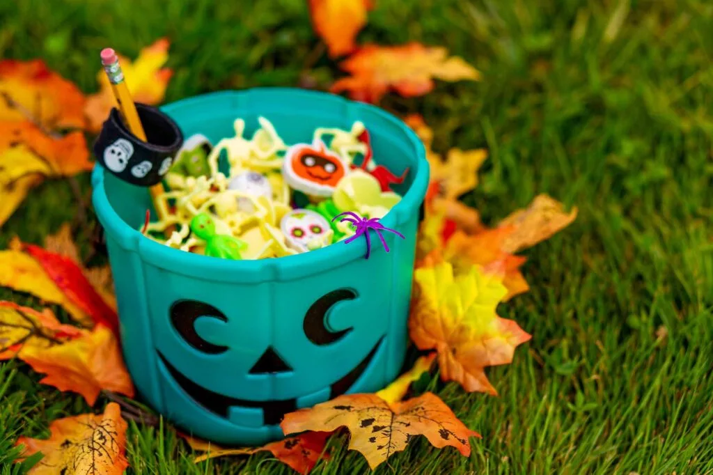 Halloween teal basket full of trinkets