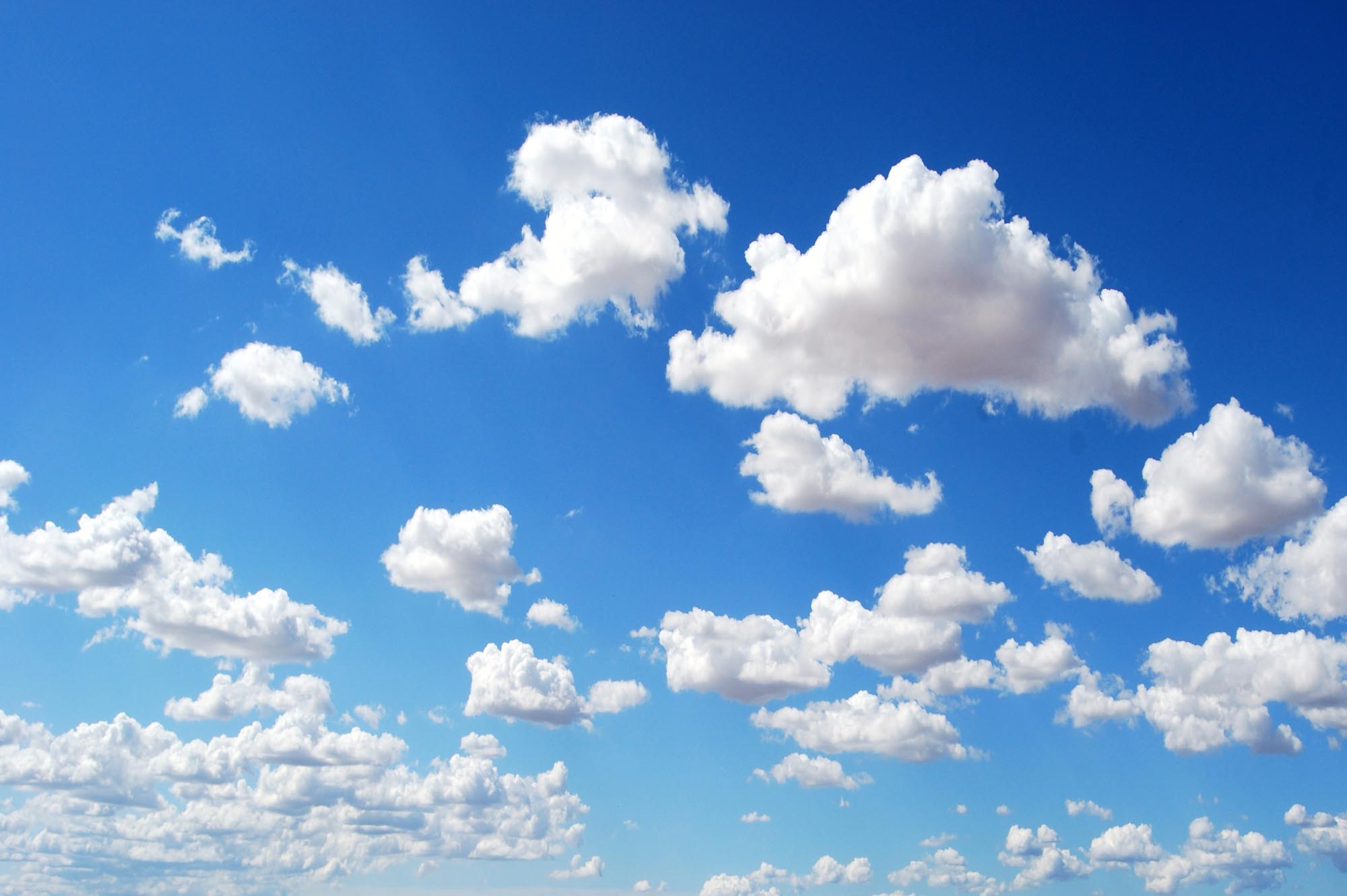 White clouds against a blue sky