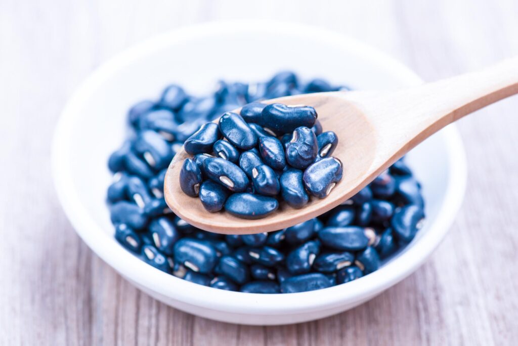 Blue beans in a white ceramic bowl