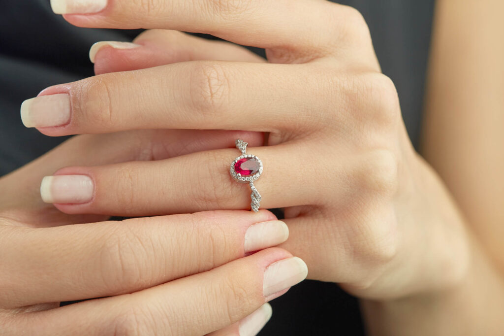 Red Ruby ring on woman's hand