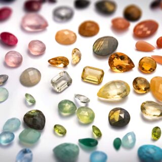 Birthstones by month spread on a desk