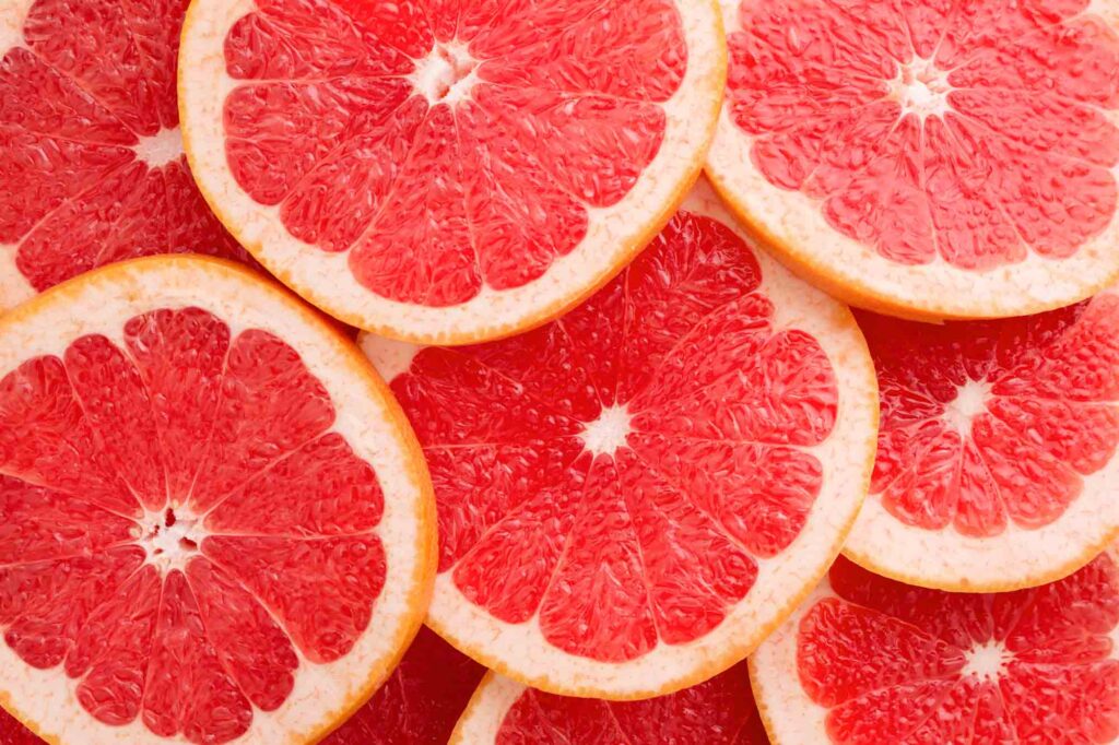 Slices of coral grapefruits