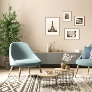 Two blue armchairs in modern beige living room