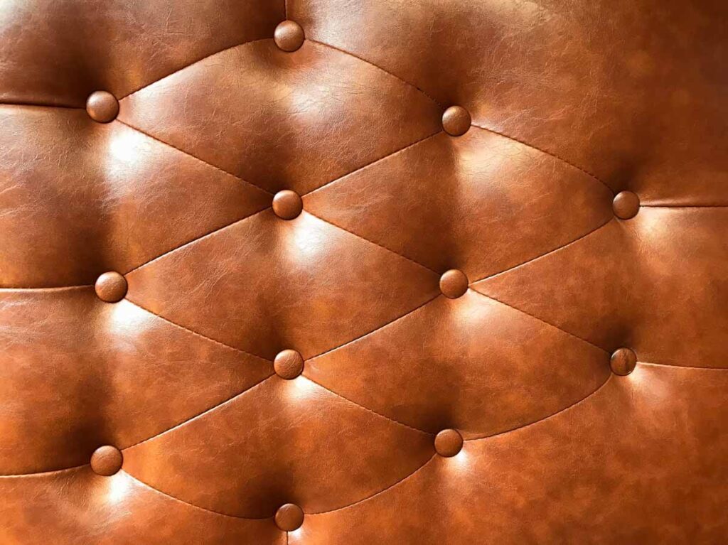 Brown cognac leather pattern with button