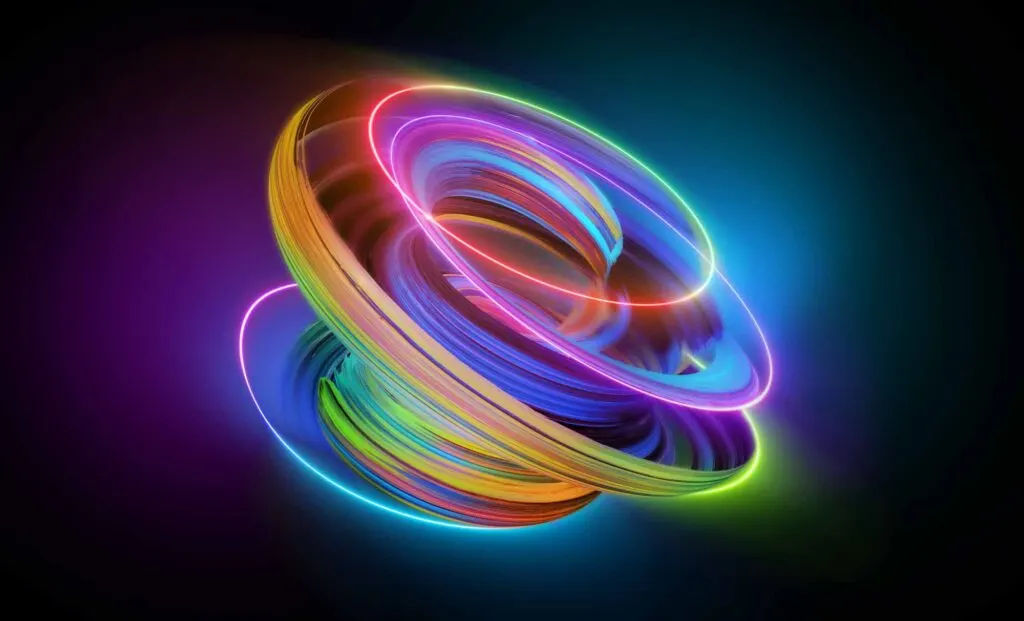 Abstract colorful neon light spiral glowing in the dark
