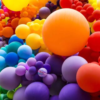Bright rainbow colored balloons
